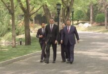 Chinese President Xi Jinping takes a walk with Spanish PM Pedro Sanchez, 11 April 2025
